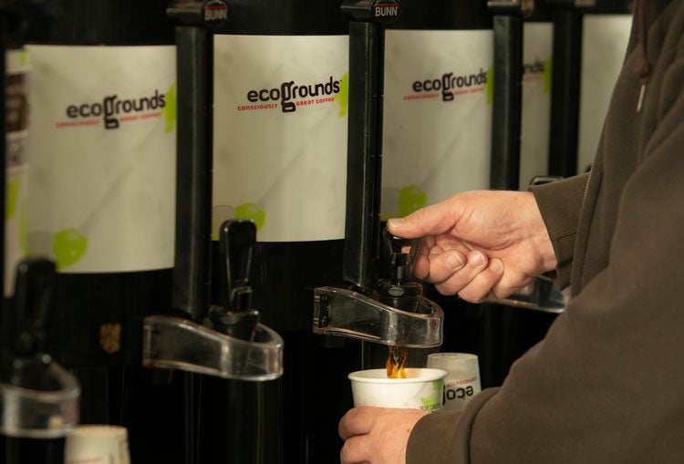 Pouring a cup from ecoGrounds shuttle.