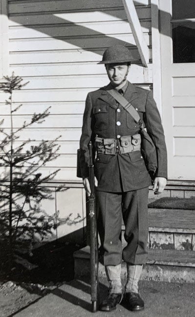 Young man in military uniform