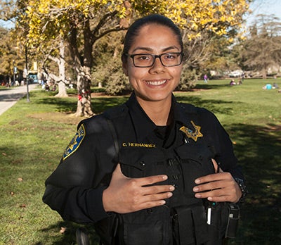Catalina Hernandez in police uniform on the UC Davis campus