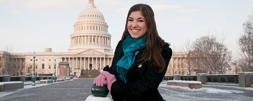 Portrait of Gina Drioane in front of the U.S. capital