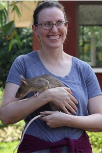 Amanda Irish holding a large rat.