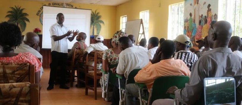 Community members attend a PREDICT presentation in Sierra Leone