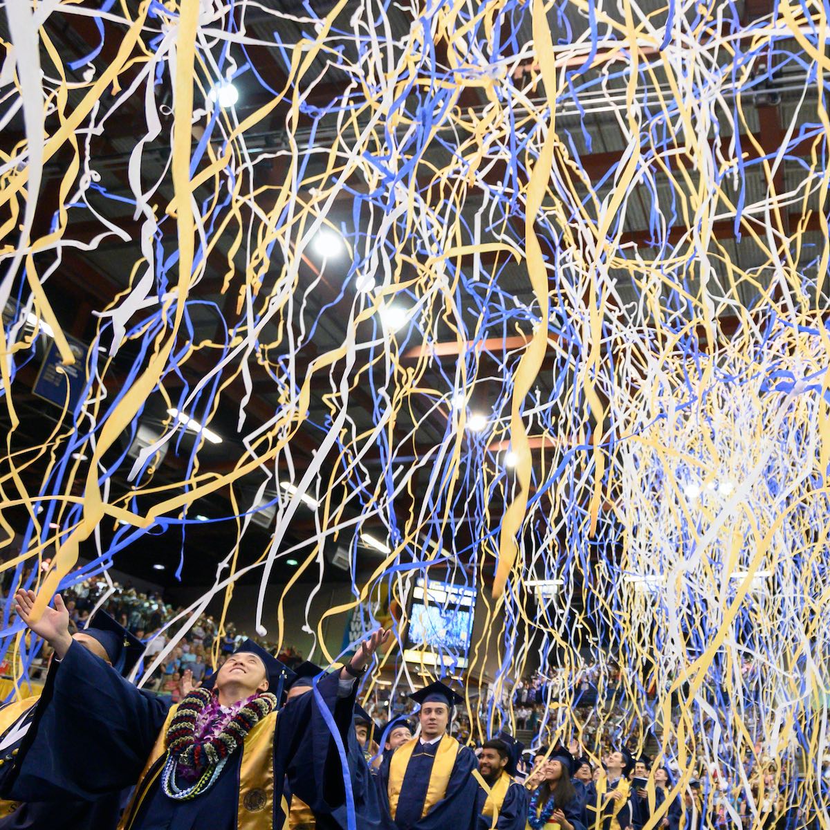 streamers coming down at UC Davis commencement 