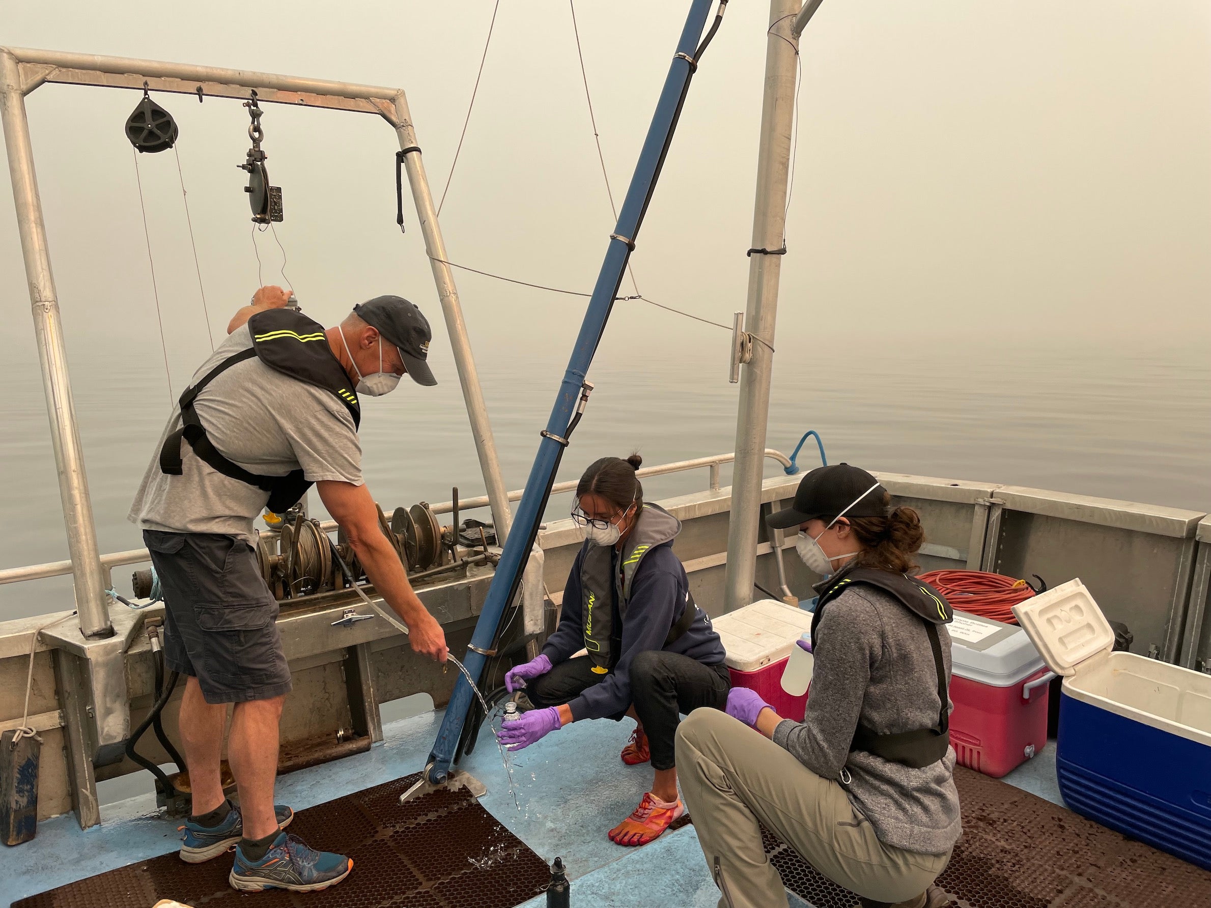 Field staff at Tahoe Environmental Research Center monitor the lake during a smoke event in August 2021. 