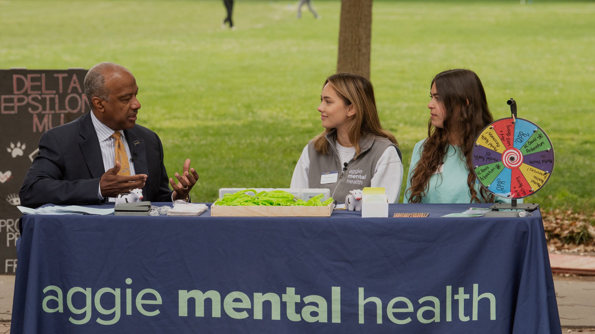UC Davis Chancellor Gary S. May engages with students at the Aggie Mental Health booth to discuss the importance of student wellness on campus. (Gregory Urquiaga/UC Davis)