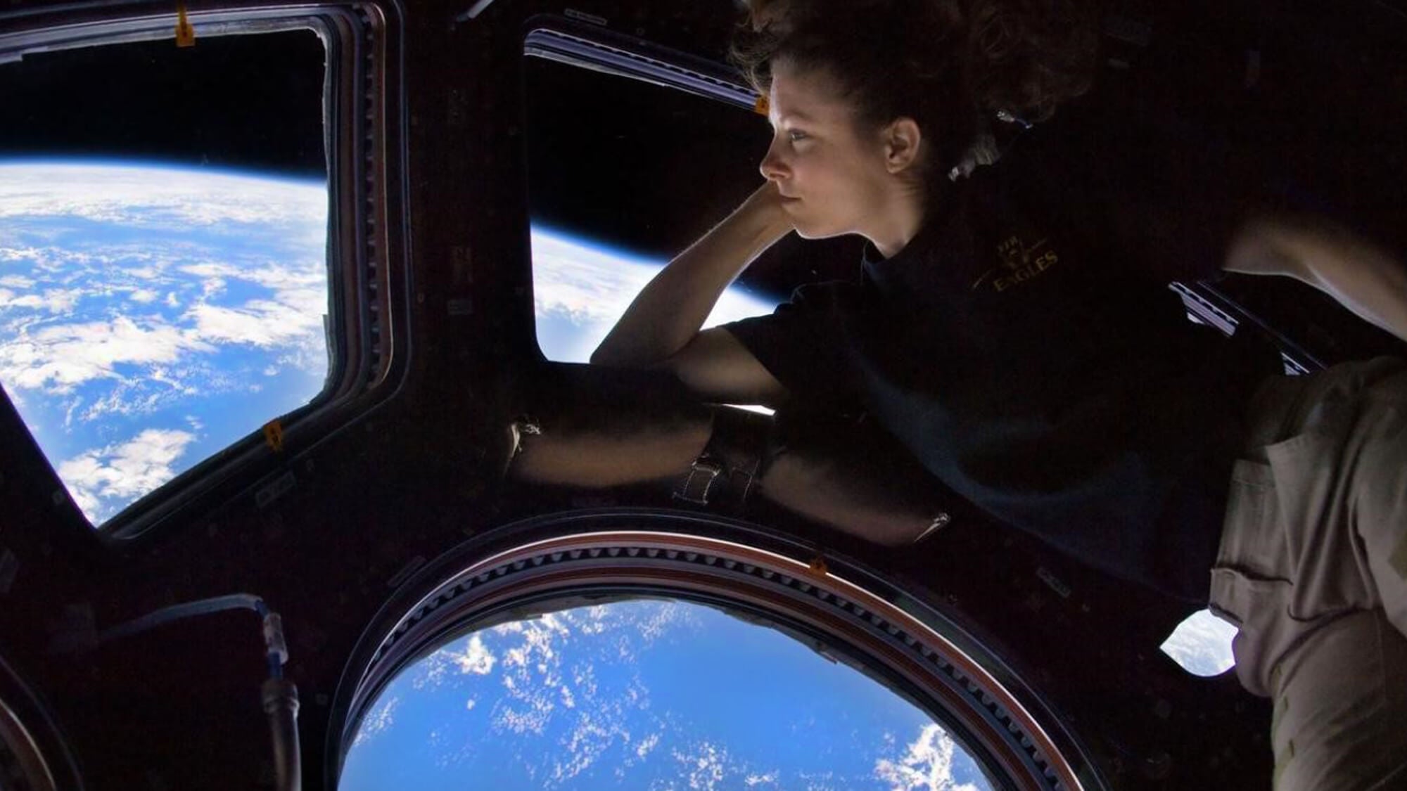 Tracy Caldwell Dyson (Ph.D. Chemistry, ’97) enjoys the view from the International Space Station cupola on her third trip to space as a NASA astronaut. (Photo credit: NASA)