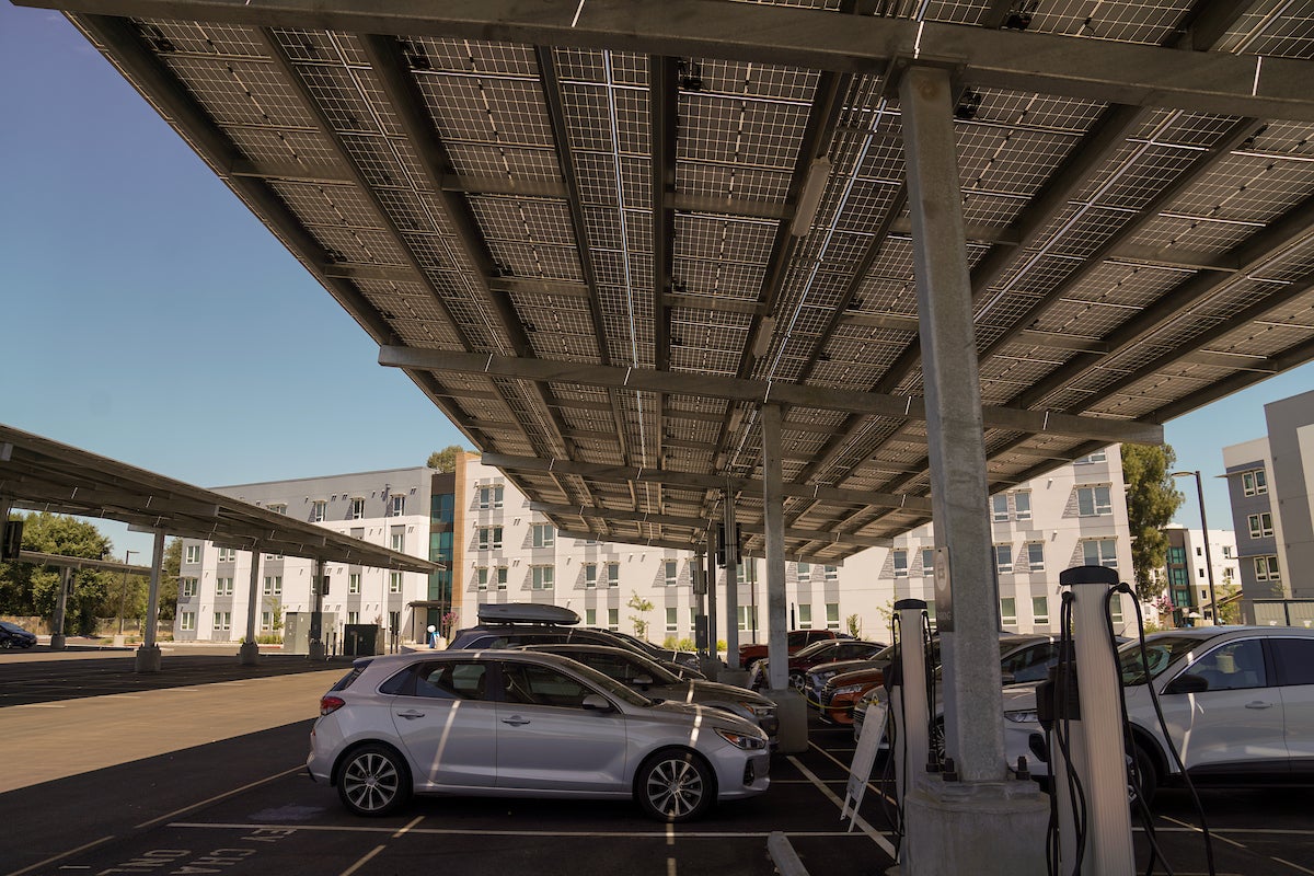 solar-powered carport, vehicles and charging station at UC Davis Orchard Park parking lot
