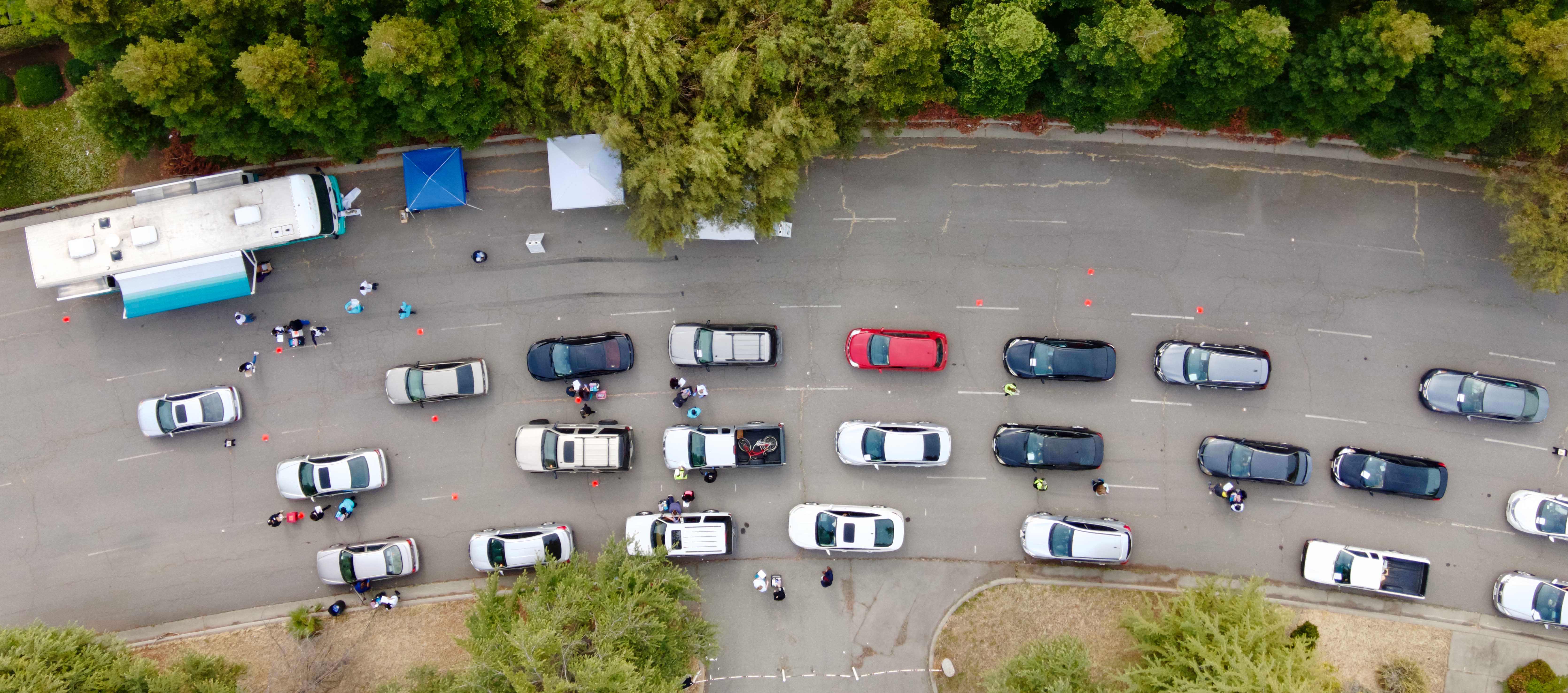 An aerial shot of cars lined