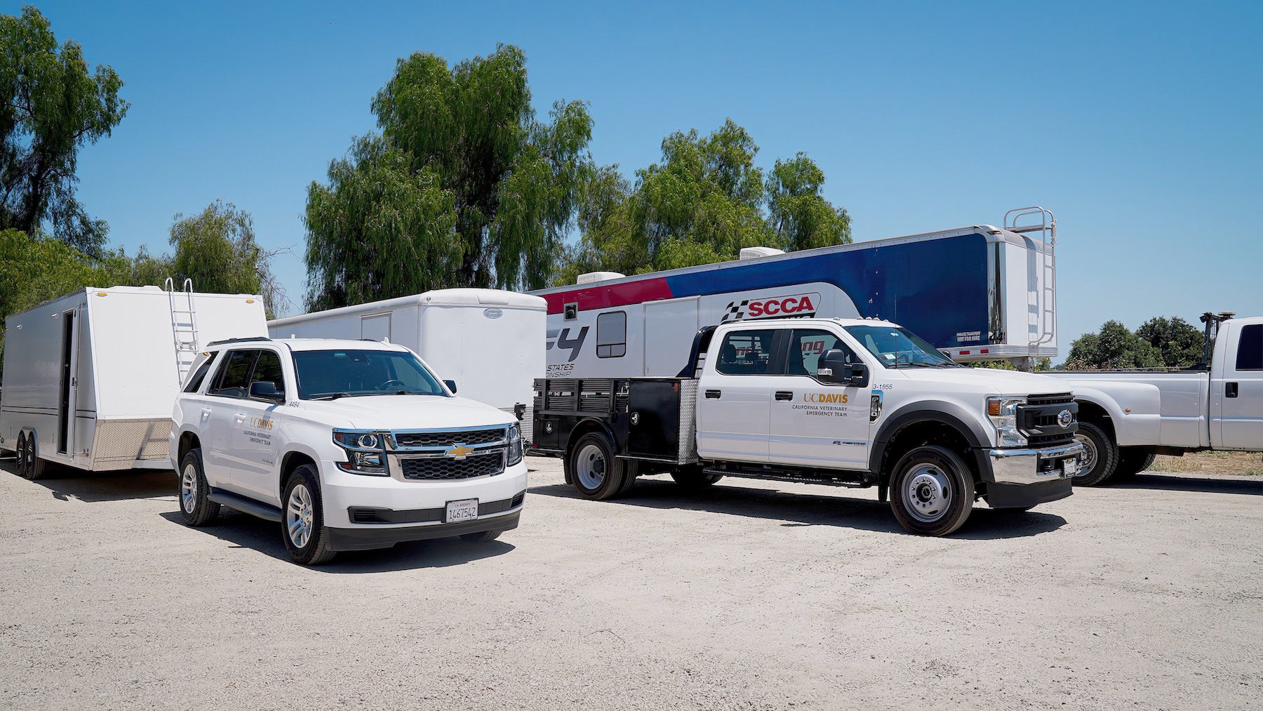 The CVET fleet of disaster response vehicles, which include a 22-foot and 24-foot trailer to serve as in-field hospitals and exam rooms for injured animals. (Vu Dao / UC Davis)