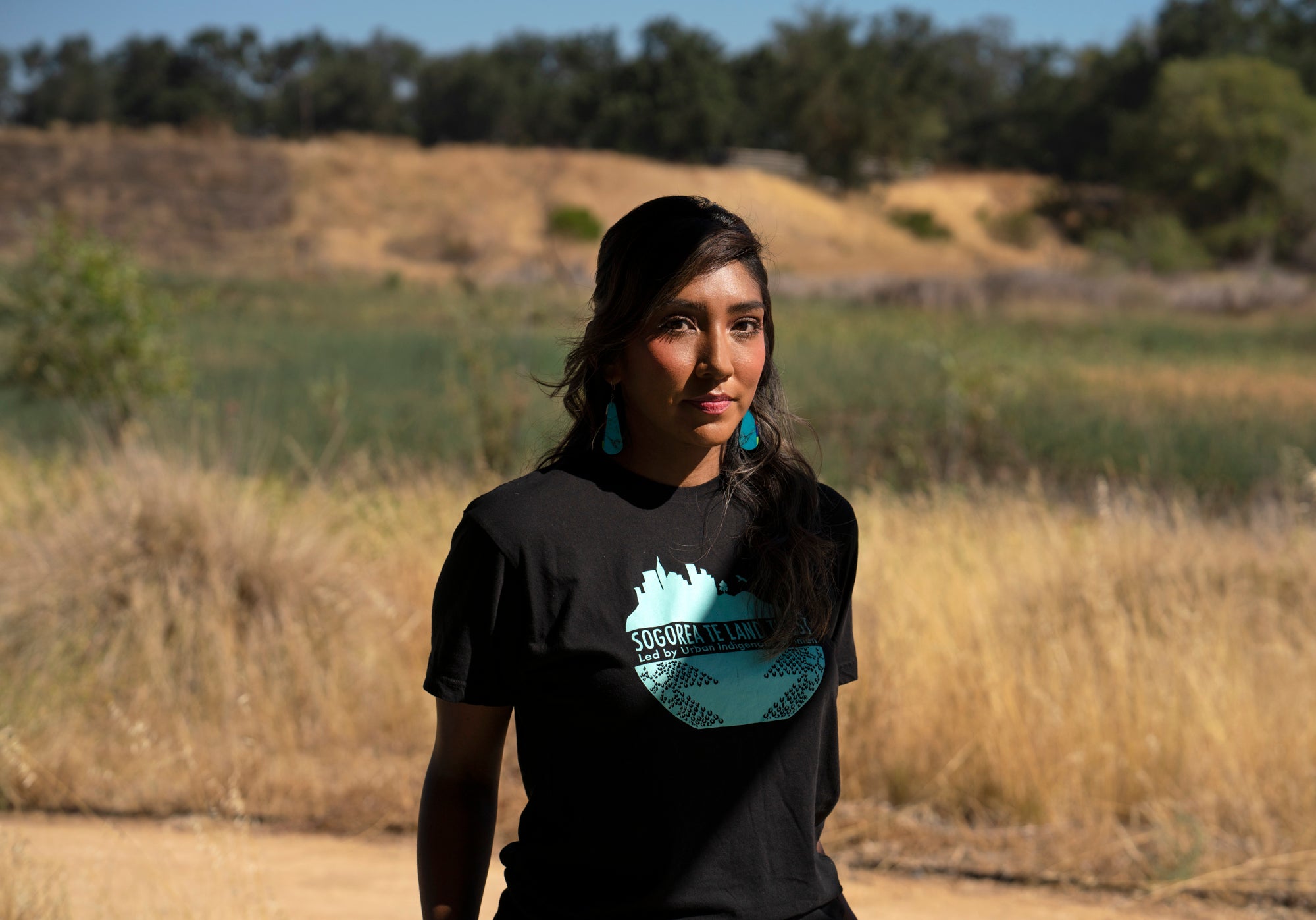 Native American scholar Melinda Adams in grassland of Yolo County