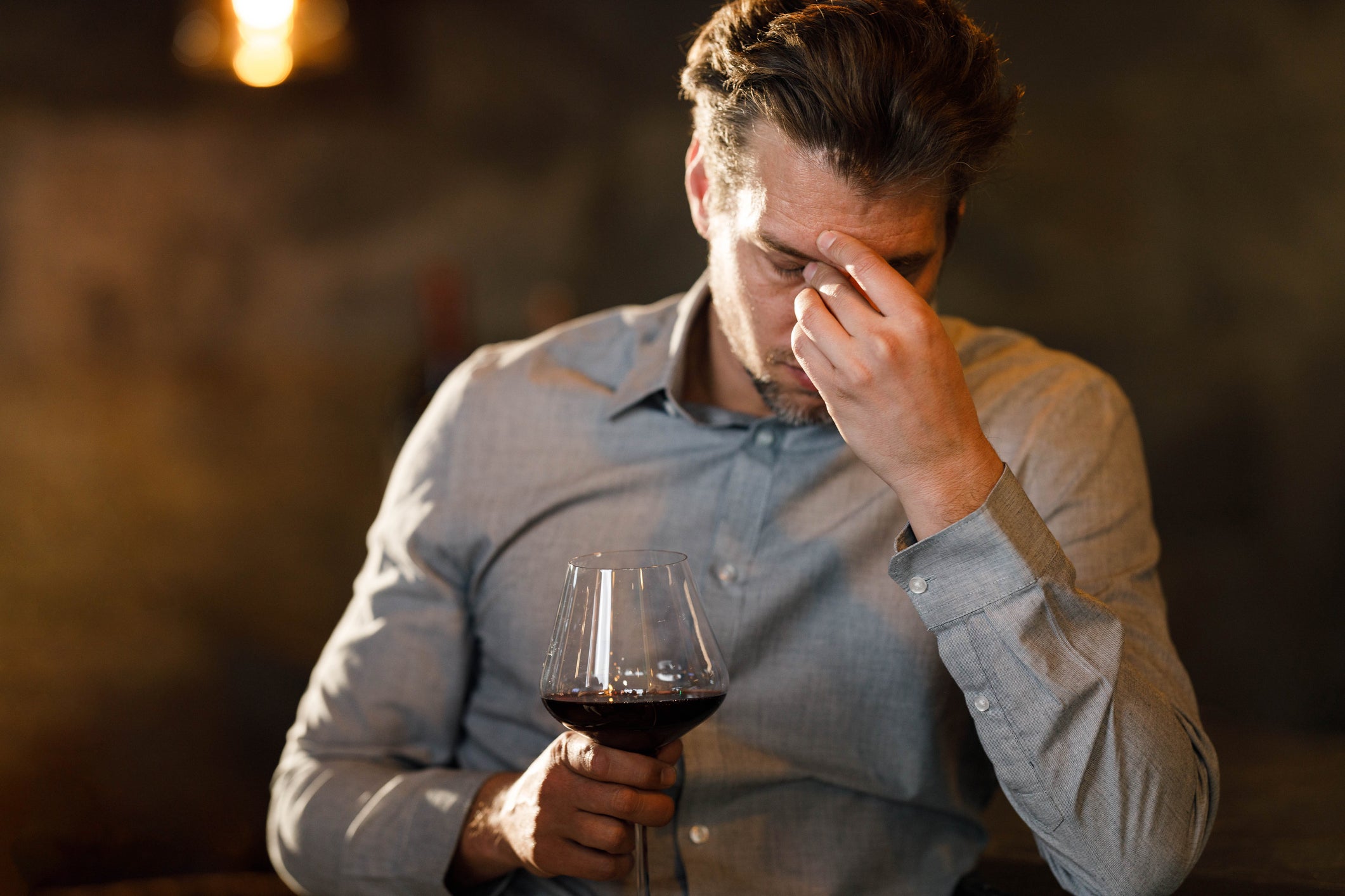 UC Davis scientists theorize that a flavanol found naturally in red wine can interfere with the metabolism of alcohol and cause a “red wine headache.” (Getty)