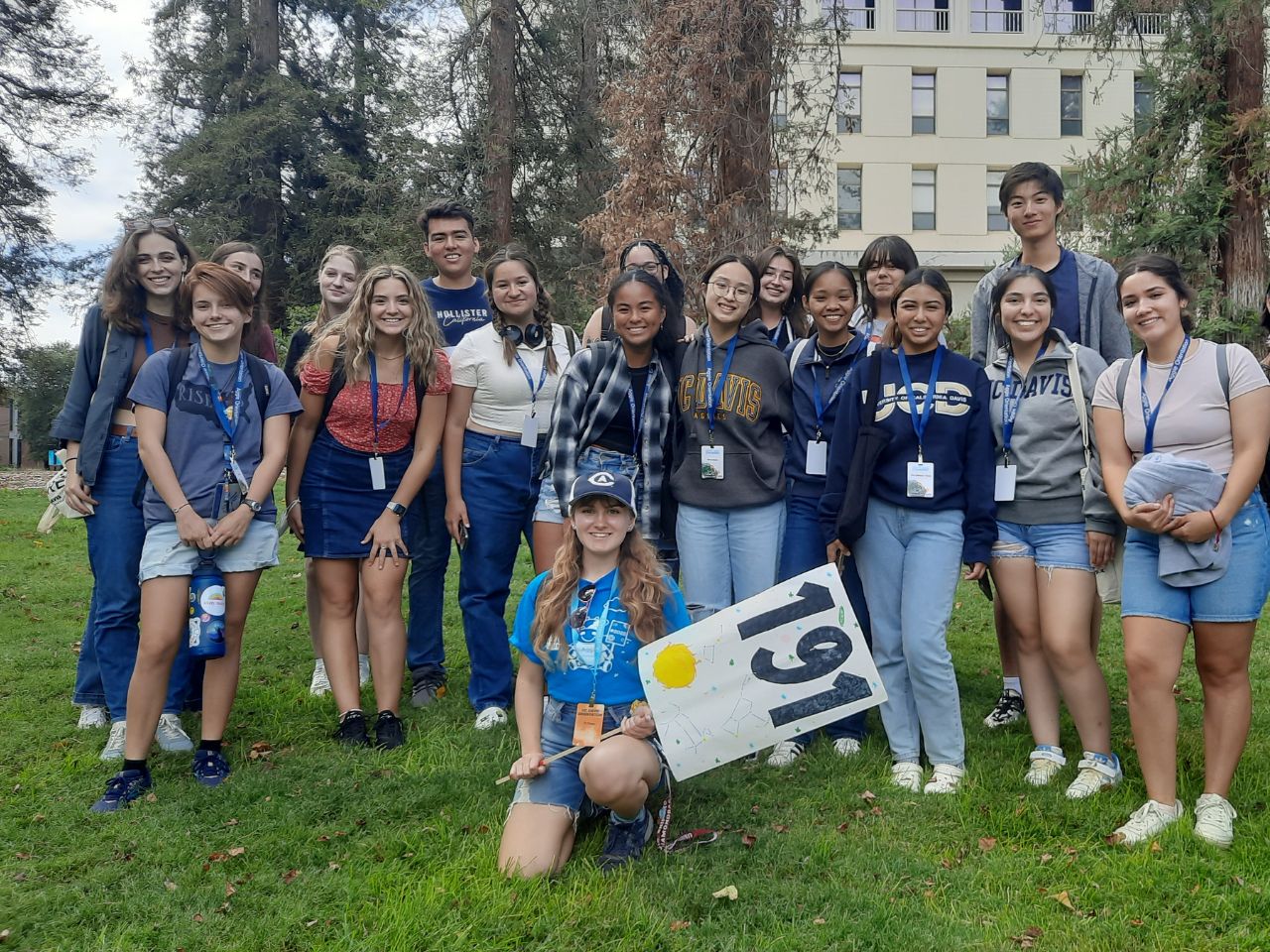 A group of UC Davis students, headed by Political Science major Ryleigh Praker, poses in the Arboretum during Aggie Orientation 2022.