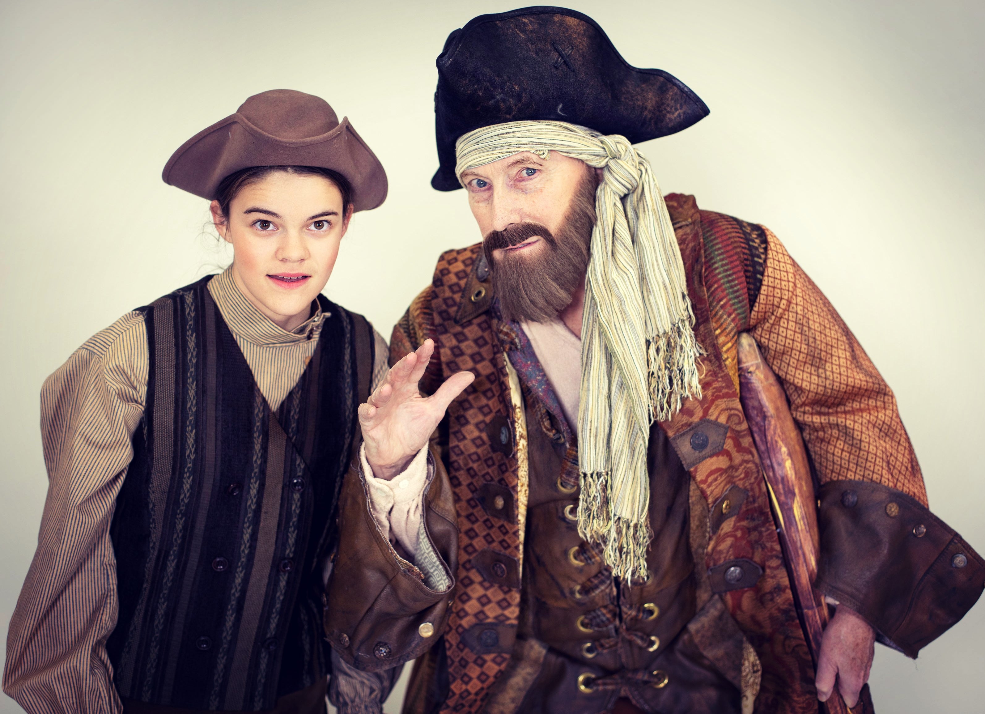 Two historically dressed characters from play in Woodland production