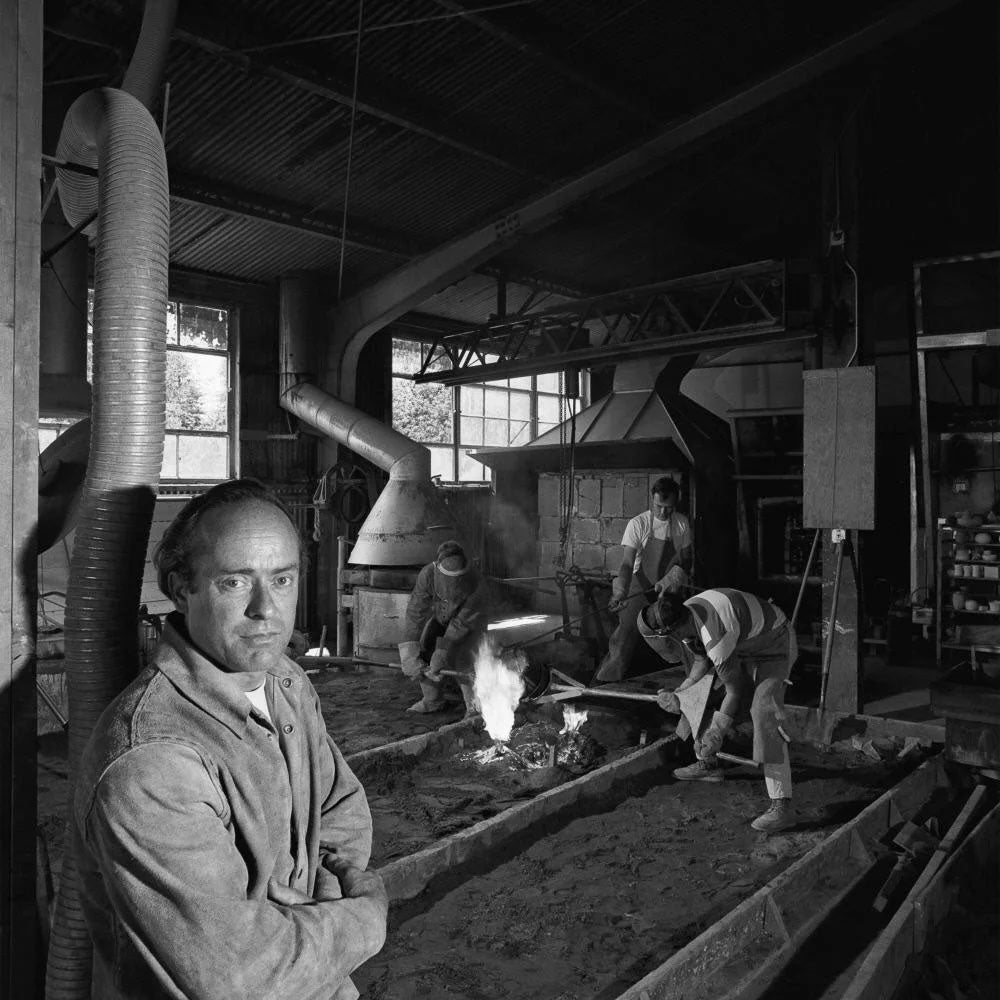 Man in black and white in art studio on UC Davis campus