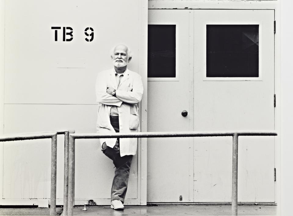 Robert Arneson, a member of the art faculty over four decades, in front of TB 9, 1991. (Copyright Estate of Robert Arneson/Licensed by VAGA at Artists Rights Society, New York, New York)