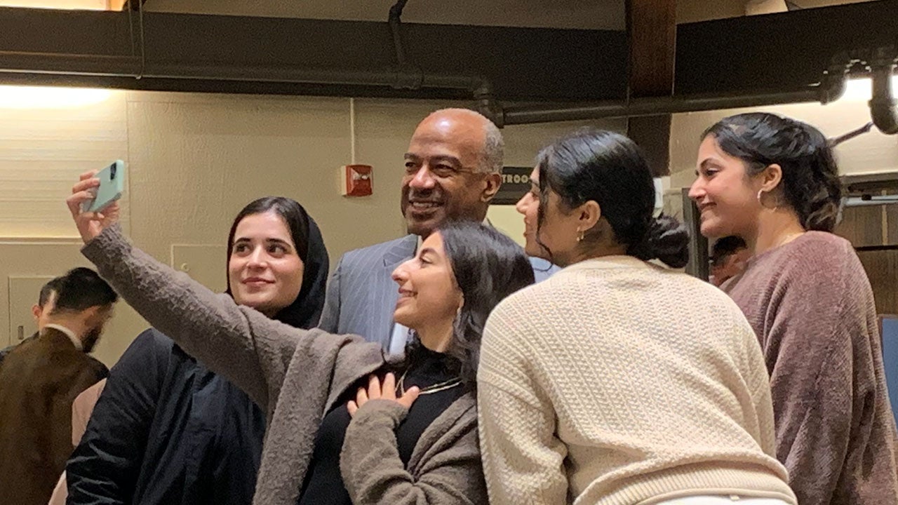 Students take a selfie with Chancellor Gary S. May