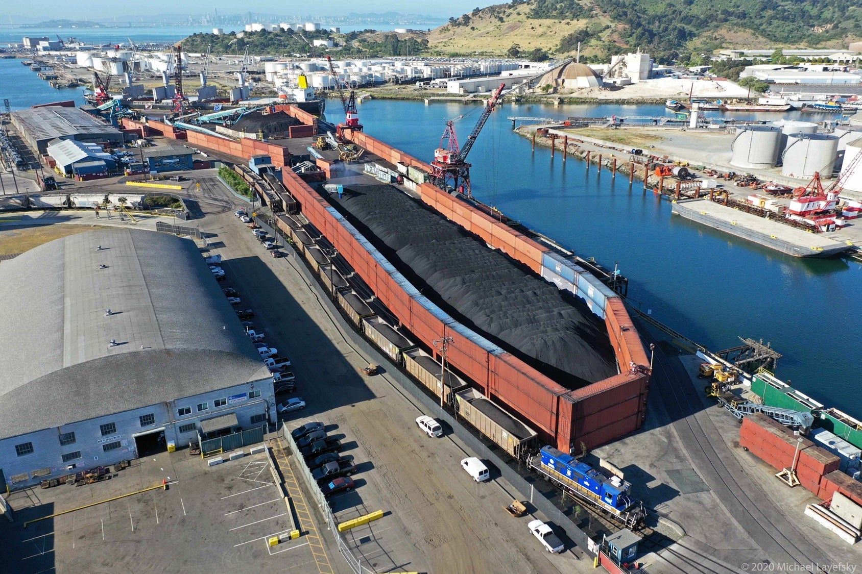drone image over of coal at the Levin terminal shipyard in Richmond, California