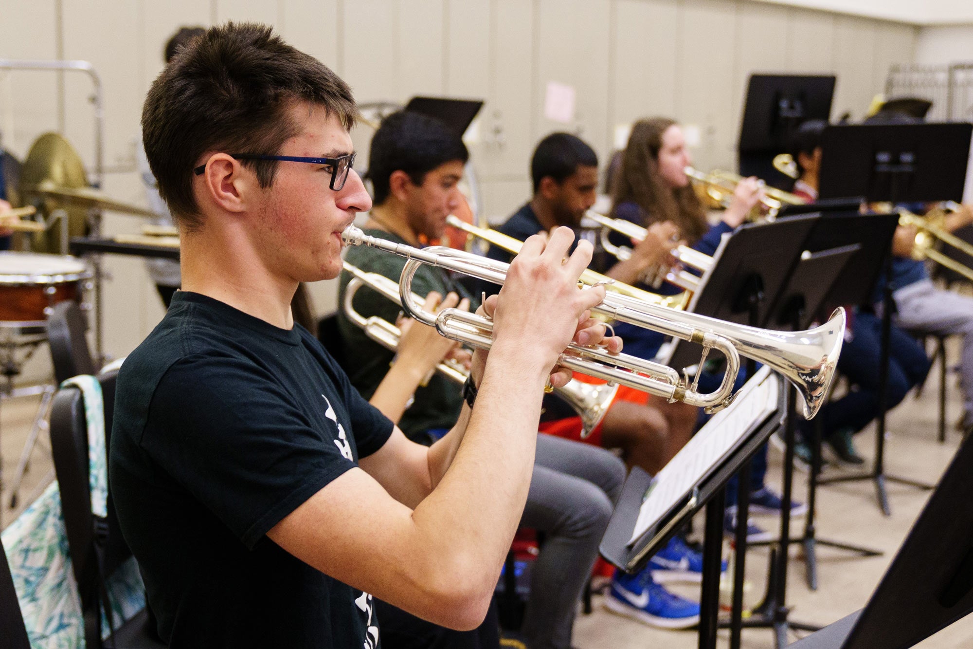 Trumpet player in Concert Band rehearsal