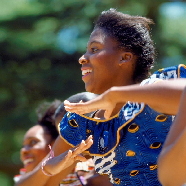 An young african-american women dances on stage during Black Culture Week