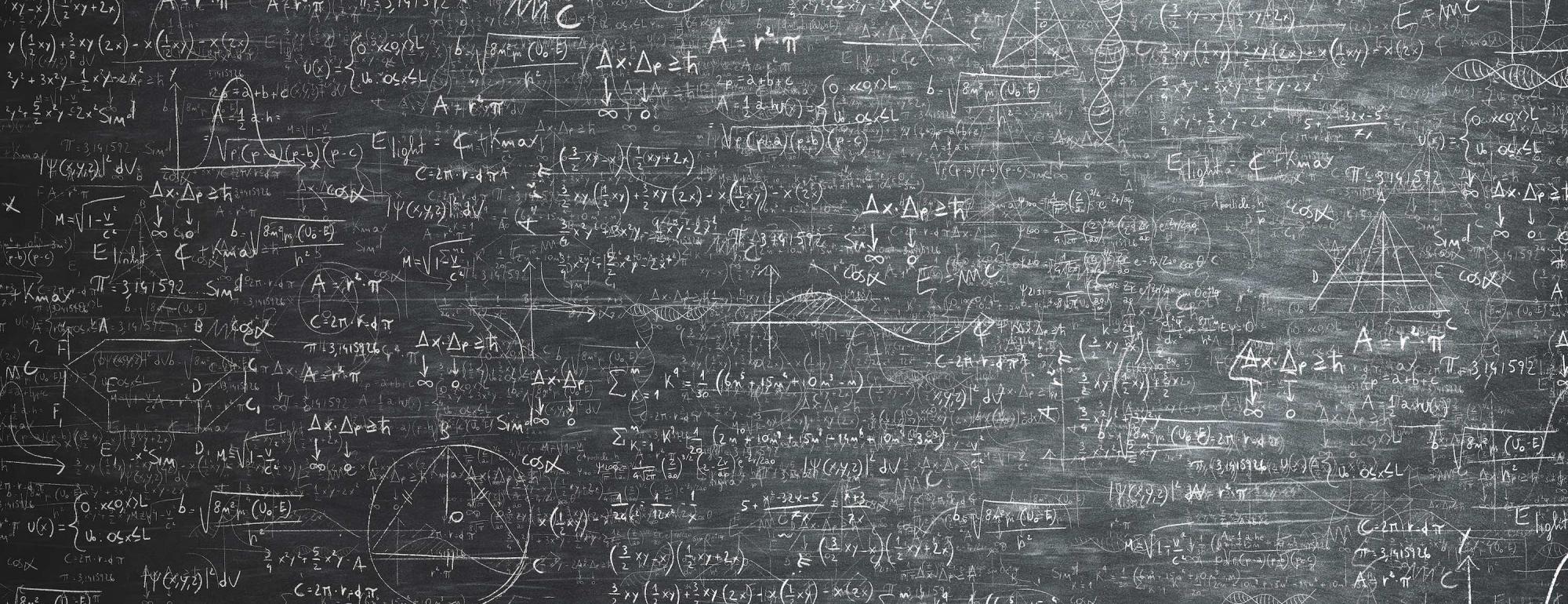 chalkboard fulled with math