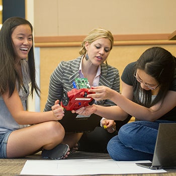 high school students work with uc davis graduate coding control for their robot