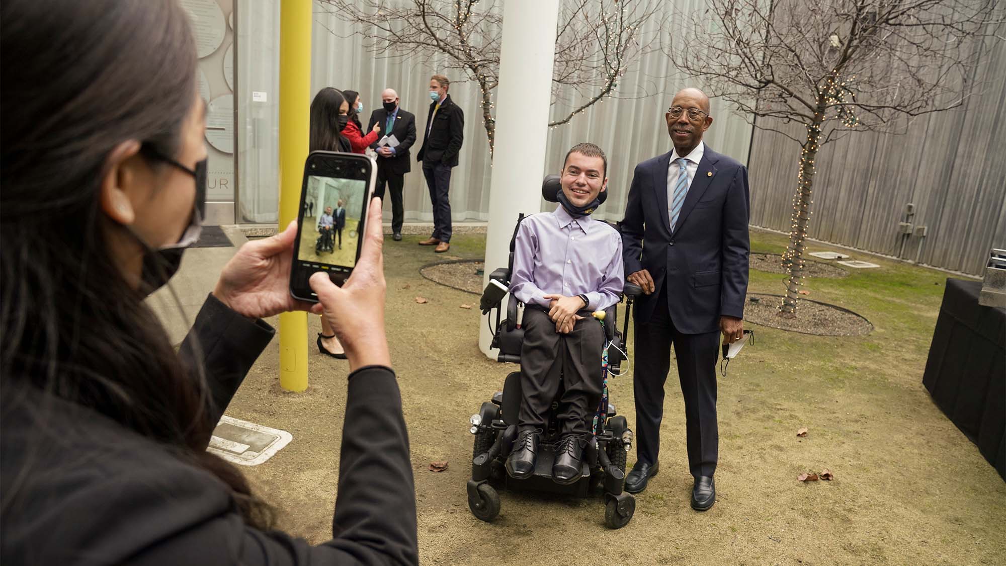 UC President Michael V. Drake poses for a photo with ASUCD President Ryan Manriquez