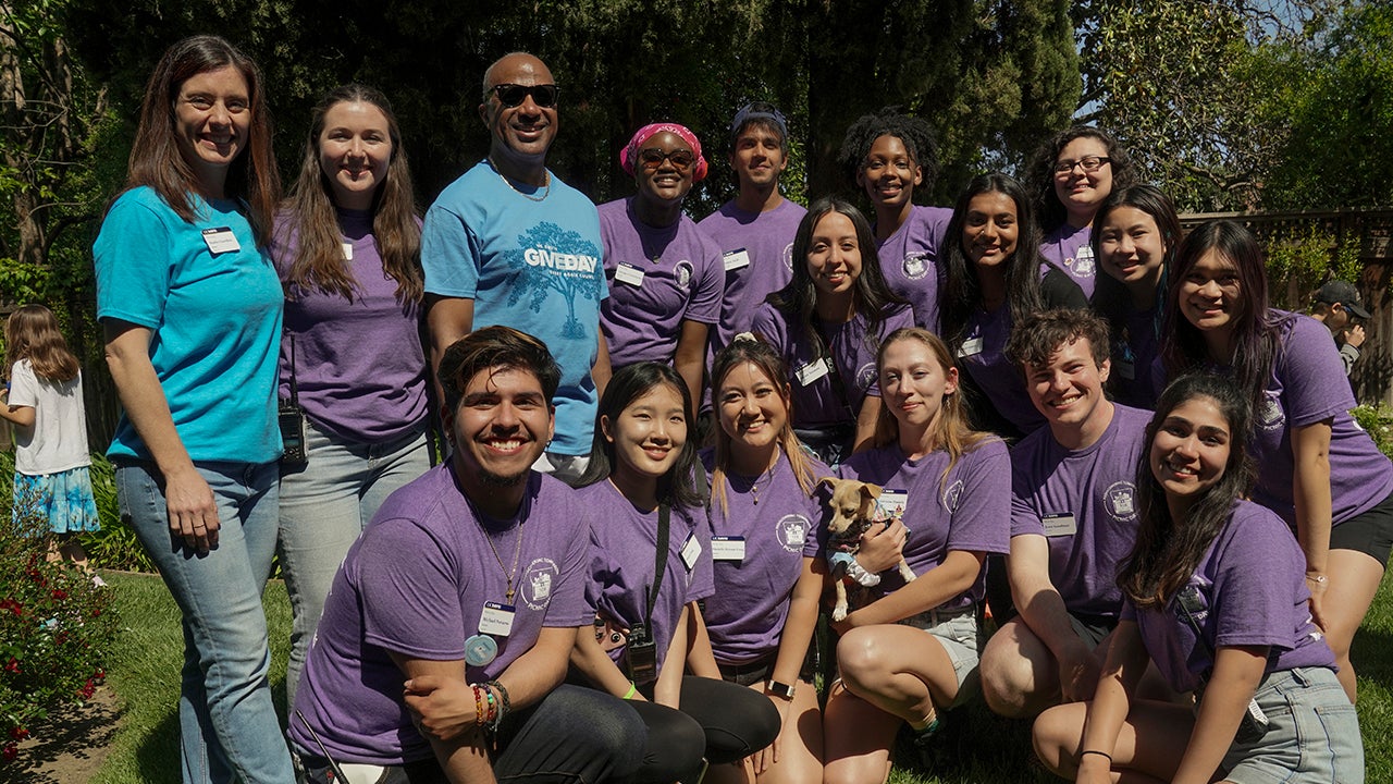 Amanda Portier is photographed with the rest of the Picnic Day board, their advisor, and Chancellor Gary S. May at the end of Picnic Day 