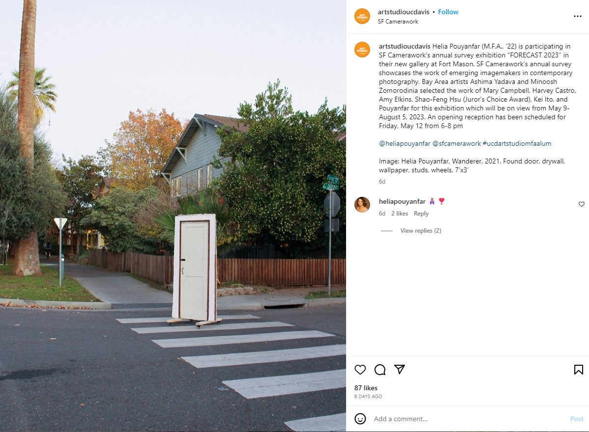 Tweet from the UC Davis Art Studio of Helia Pouyanfar's photo for SF Camerawork’s annual survey exhibition “FORECAST 2023." A white door on wheels rests in the middle of a pedestrian crossing. In the background there are trees, a sidewalk, and the side of a house.