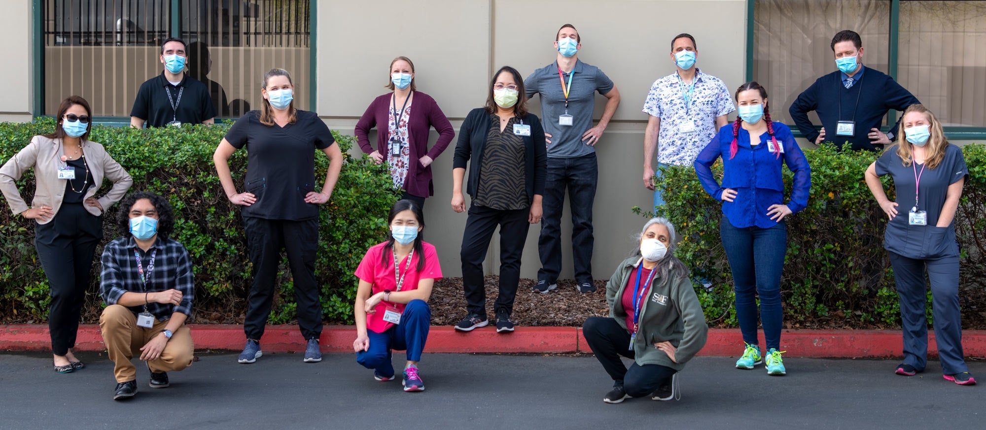 Specialty Testing Center Lab team, masked, outside, group photo
