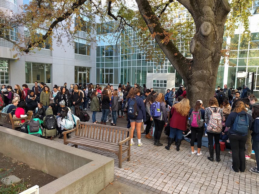 A crowd fills the Shields Library courtyard.