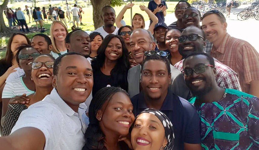 Gary May poses for a selfie with the Mandela Fellows.