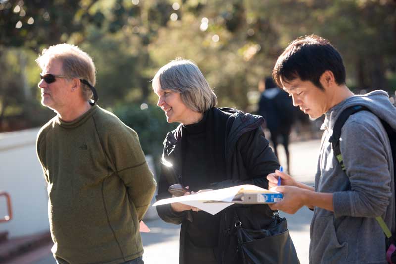 Professor Randy Dahlgren and Associate Dean Susan Ebeler with student, along Arboretum Waterway.