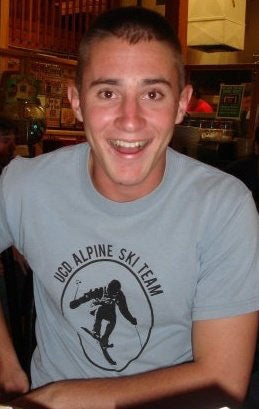 Smiling Sean Elliott in ski team T-shirt