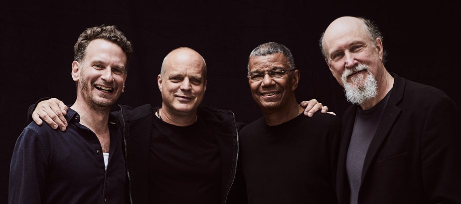 Hudson band, four men posing
