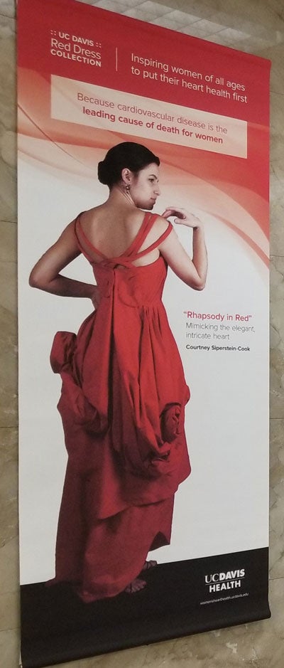 Red Dress pictured on banner