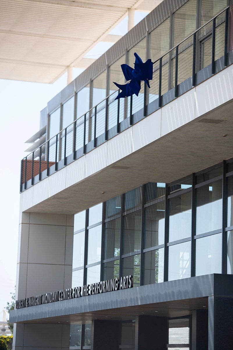 A blue ribbon attached to the Mondavi Center.