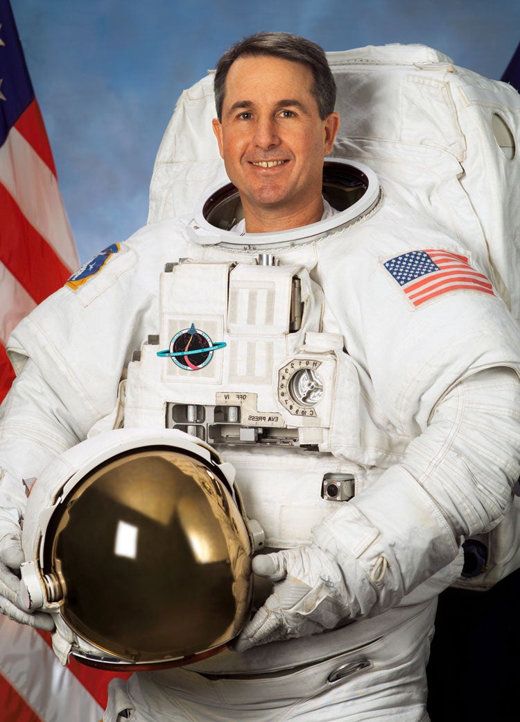 Steve Robinson in spacesuit