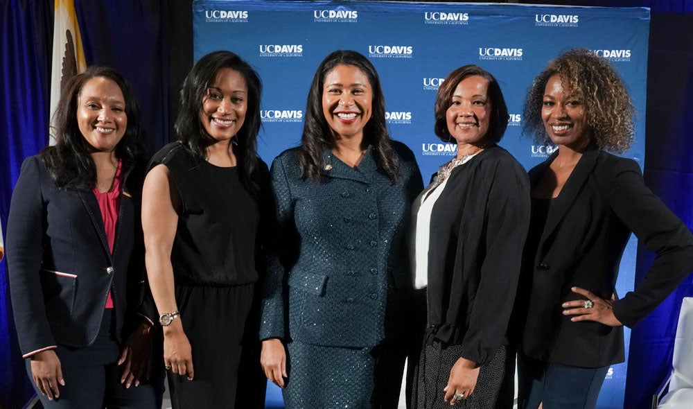 London Breed poses with four college girlfriends.