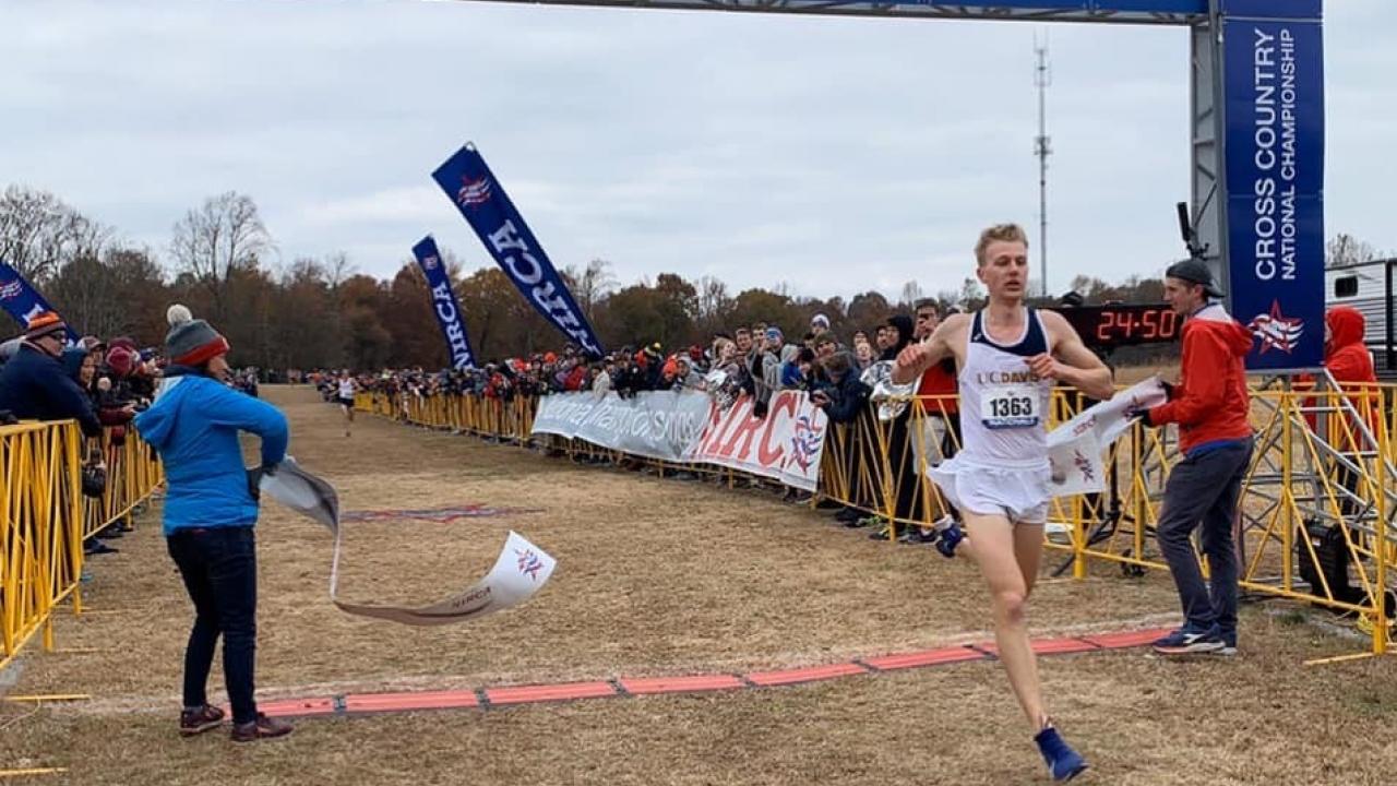 Clancy McConnell crosses a finish line.