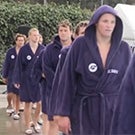 Water polo players in robes.
