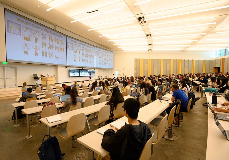 Students take a class inside California Hall.