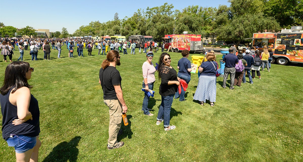 People line up for food trucks.