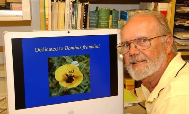 Robbin Thorpe shows photo of bee.