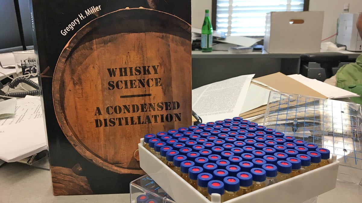"Whisky Science" book on lab shelf