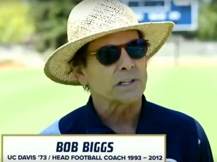Bob Biggs in hat, on video.