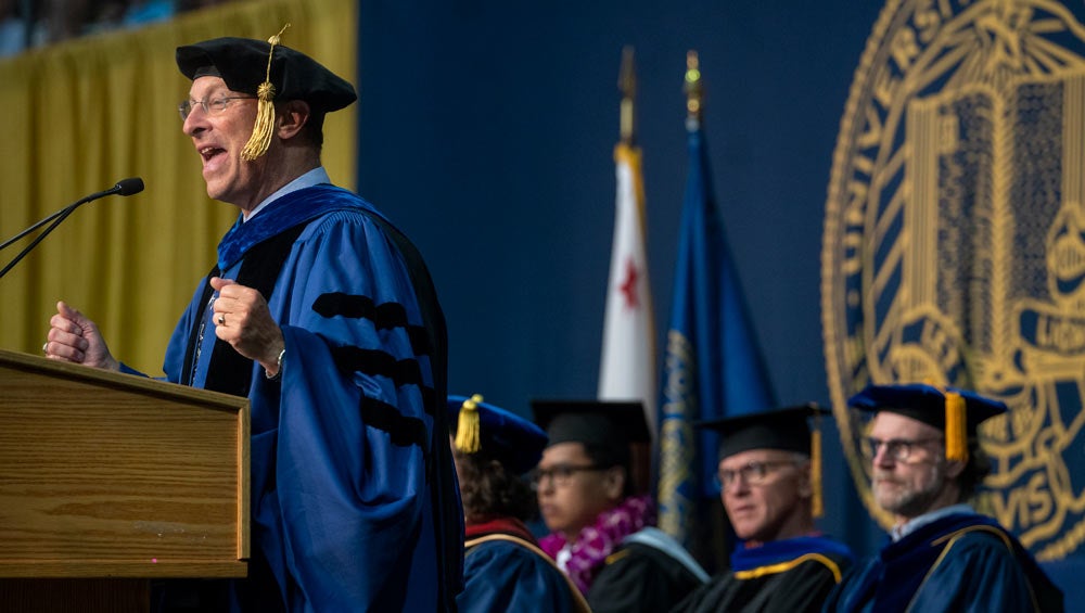 Ralph J. Hexter, in commencement regalia, addresses graduates.