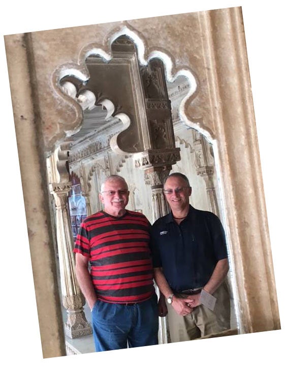  Ralph J. Hexter and Manfred Kollmeier in ornate doorway.