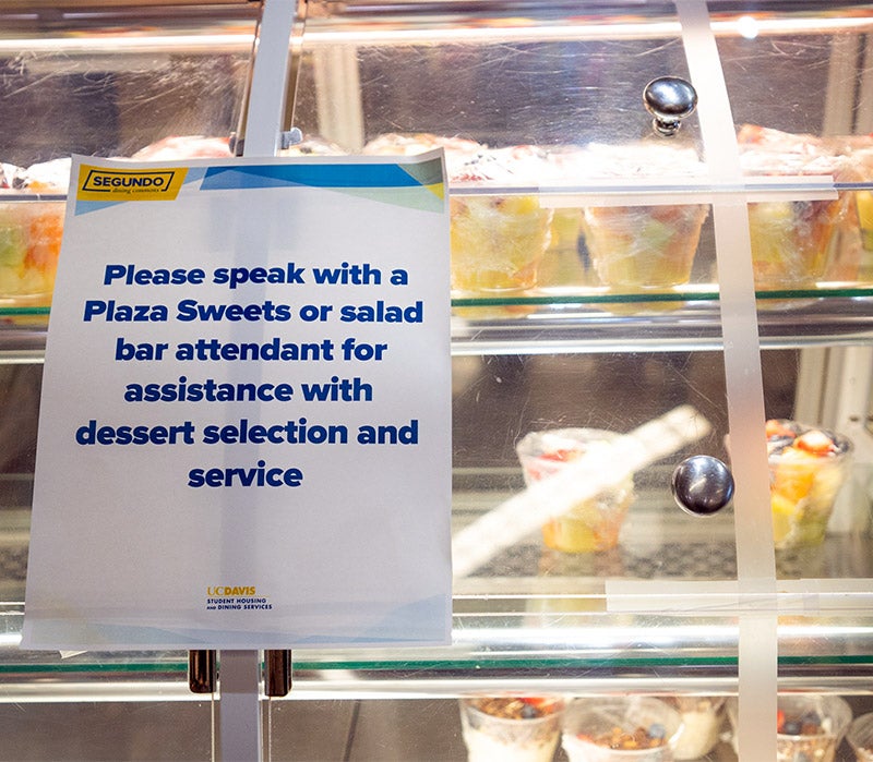 Sign on dessert case says to ask staff for assistance.