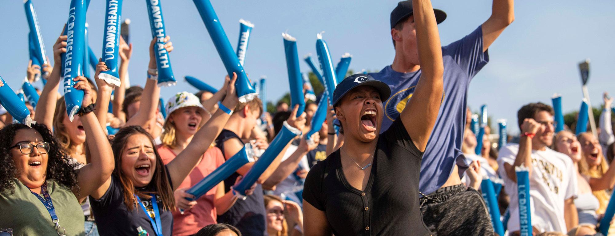 A rowdy crowd cheers on the Aggies at UC Davis Health Stadium.