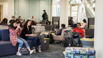 students study in a study lounge just outside the UC Davis Coffee House